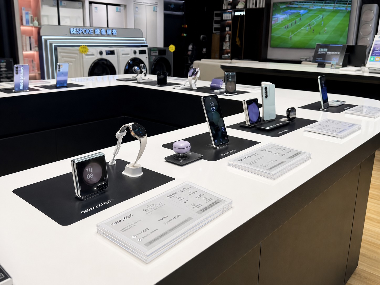 Galaxy digital wall and phone display zone inside Samsung mobile retail store