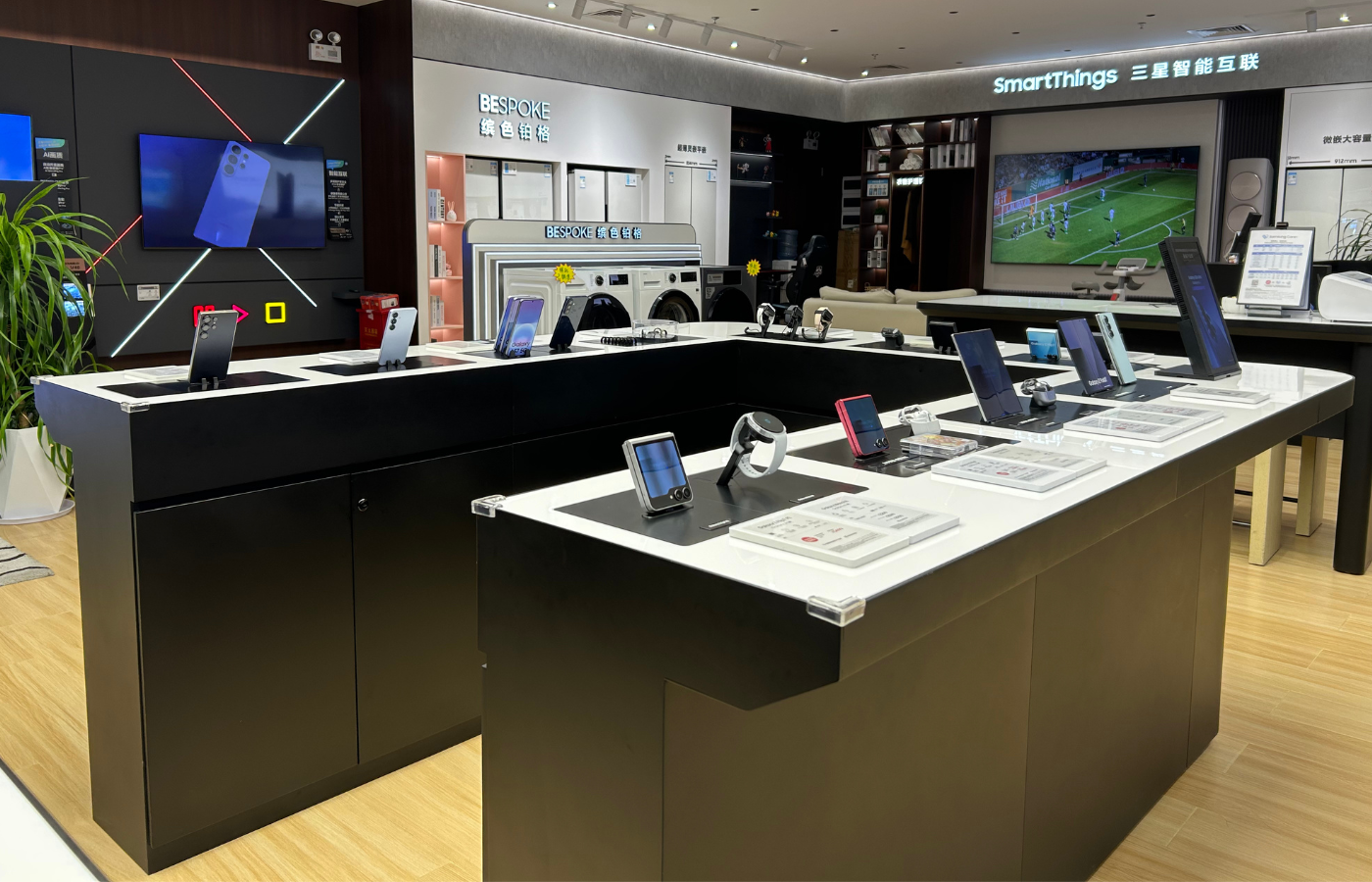 Samsung mobile display table angled view in store context