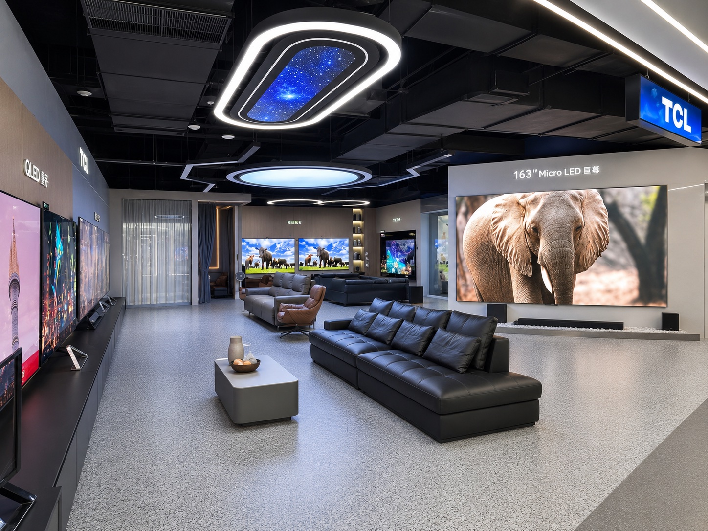 TCL living-room style home cinema experience area with 163-inch Micro LED screen and sofa seating
